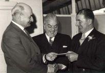 Stan receiving thank-you cheque.